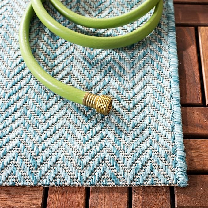 SAFAVIEH Outdoor Area Rug 6'7"x9'6" - Image 3